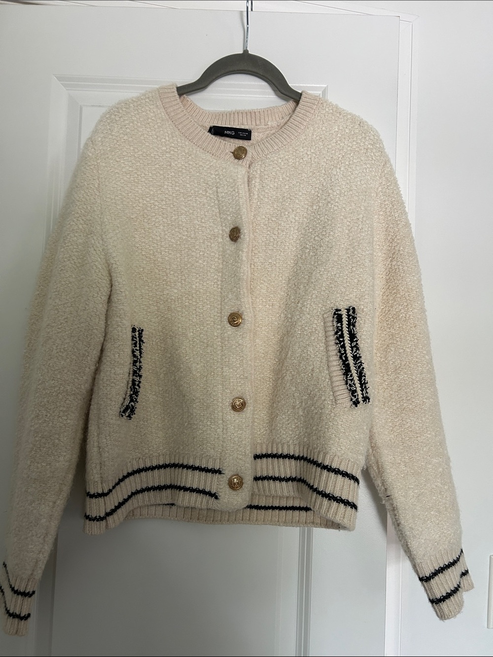 Cream Bouclé Cardigan with Black Trim